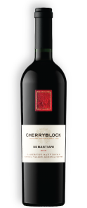 ottle of Cherryblock wine displayed against a neutral background, showcasing its elegant label 