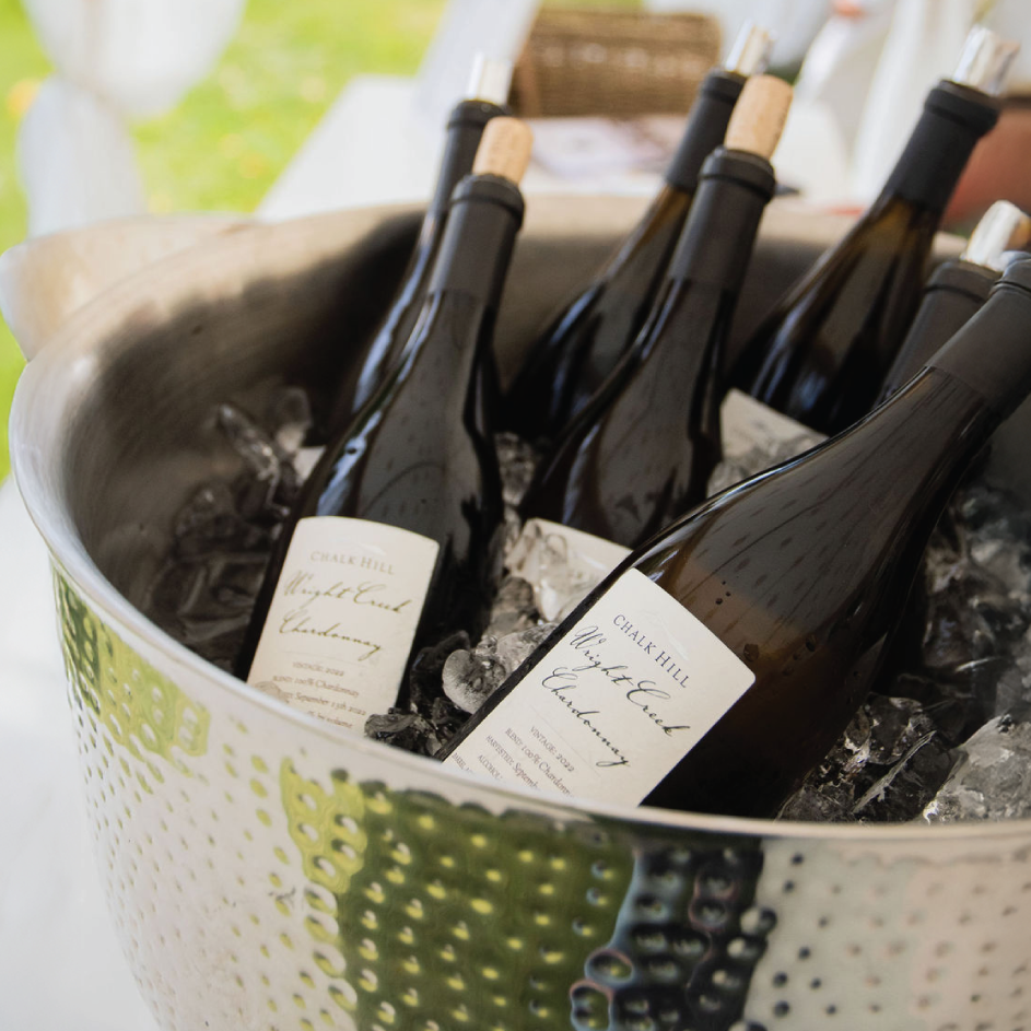 5 bottles of chalk hill wines on ice 