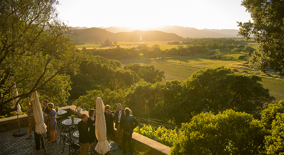 an arial view of Silverado vineyard from the patio as the sun begins to set behind the hills
