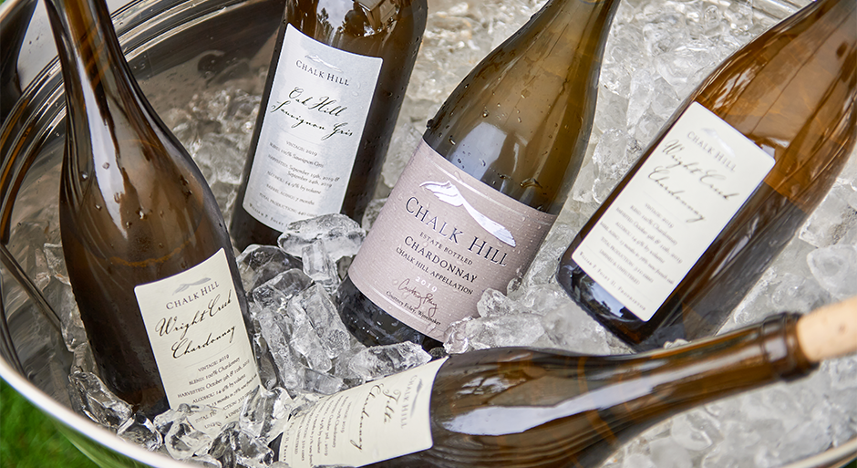 5 bottles of chalk hill wines on ice